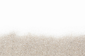 Scattered sand on white background