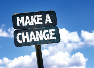 Make a Change sign with clouds on background