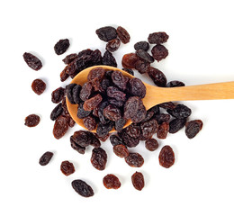 Dried raisins on white background.