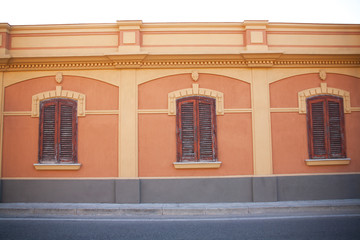 three windows of an ancient italian house