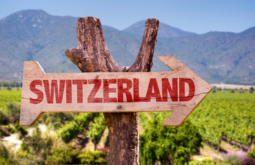 Switzerland wooden sign with winery background