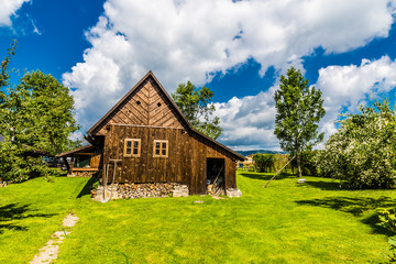 Obraz premium Traditional wooden village house-Czech republic
