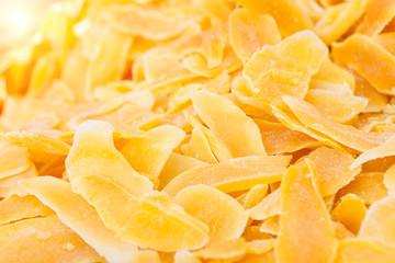 Heap of dried mango slices on a hotel restaurant buffet line