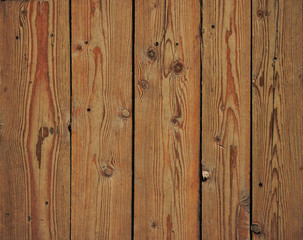 Vintage wooden panel with vertical planks and gaps
