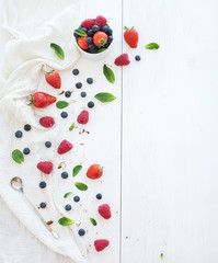 Naklejka na ściany i meble Berry frame with copy space on right. Strawberries, raspberries