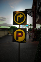 Turn right to car park signs