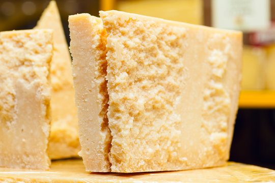 Piece of Grana Padano or Parmigiano Reggiano aka Parmesan cheese
