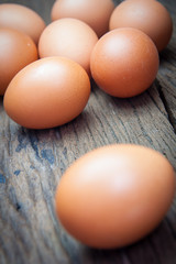 Eggs on wood background