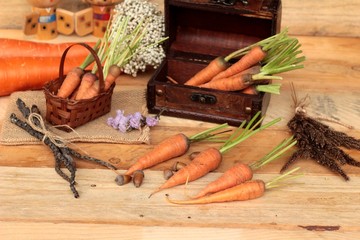 fresh carrot on wood background