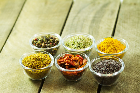 spices and seasonings on a wooden table