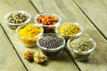 spices and seasonings on a wooden table