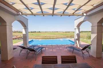 swimming pool outside luxury home and beautiful view