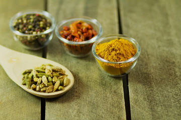 spices and seasonings on a wooden table
