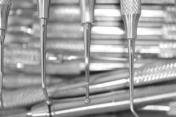 Fototapeta na wymiar Background of manual cleaning dental instruments