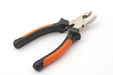 pliers with colored pens on a white background