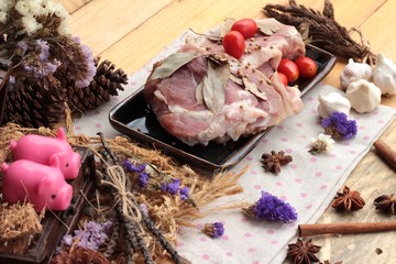 Raw pork for cooking with garlic and pepper.
