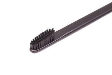 Black toothbrush  on white background