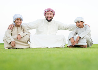 Happy Muslim family on summer vacation