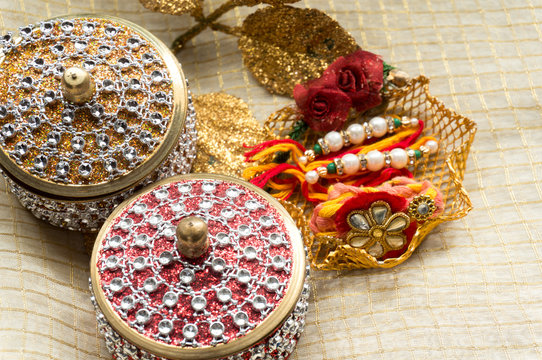Rakhi threads with jewelled boxes