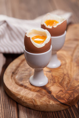 Boiled eggs on a wooden background
