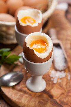 Boiled eggs on a wooden background