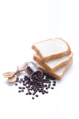Fototapeta na wymiar Slice of bread with Coffee Bean on white table