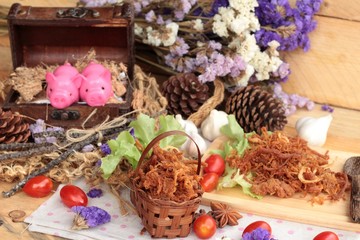 Dry roast pork into strips.