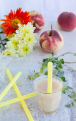 Smoothie melon and peach.Cool,healthy drink made from fresh berries and fruits. selective focus