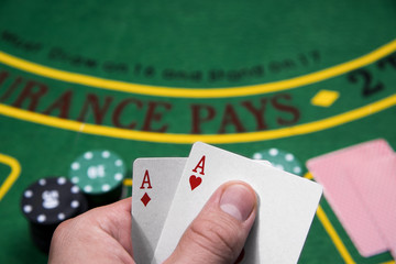 Casino, gambling, poker, people and entertainment concept - Two Aces playing