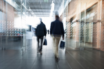 Intentional blurred image of people in shopping center