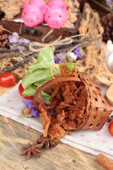 Dry roast pork into strips.