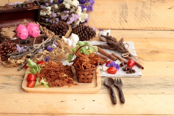 Dry roast pork into strips.