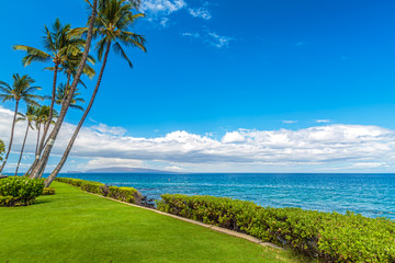 A view from the coastline of Kihei on Maui, Hawaii, with the island of Kahoolawe on the horizon