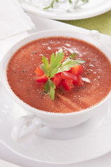 tomato soup in a white bowl
