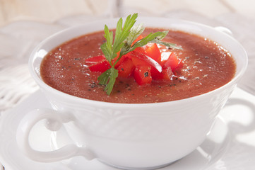tomato soup in a white bowl
