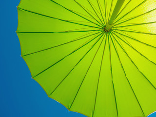 Green parasol against the sky © Alfonsodetomas