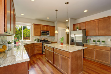 Modern kitchen with simple wood cabinets.