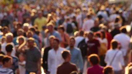 Anonymous street crowd backlight shot - Powered by Adobe