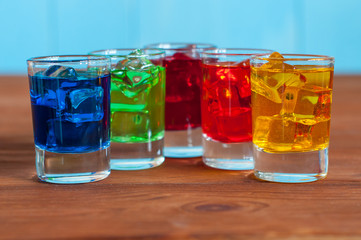 Set of alcoholic cocktails on rustic wooden background