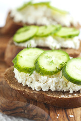 Sandwich with fresh cream cheese, cucumber and pink salt