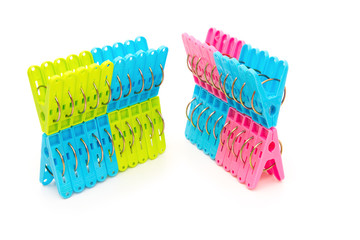 lots of clothespins on a white background