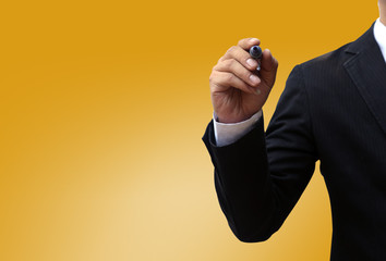 Fototapeta premium Businessman writing, drawing on blank space