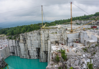 Deep Quarry actively being used to drill, cut and haul huge blocks of grey Barre granite for...