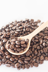 Spoon of roasted coffee bean