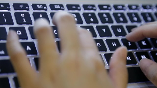Typing on laptop keyboard