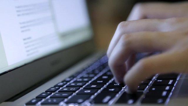Typing on laptop keyboard