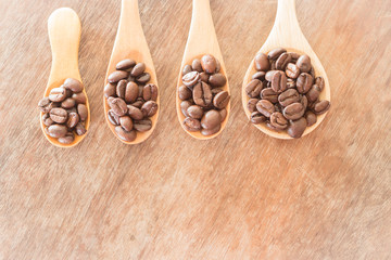 Obraz premium Coffee spoons on grunge wooden table