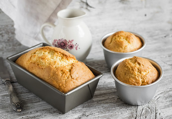 simple cakes in the baking dish on a light wooden background