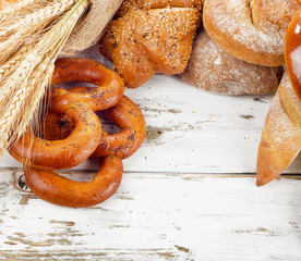 Different fresh bread and wheat
