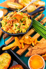 Scrambled eggs with fried chanterelles